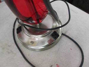 lot 174 image: 1 red lamp and 1 clear lamp with pl...