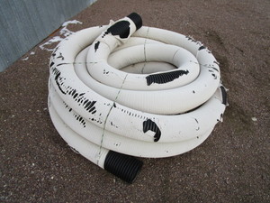 lot 11 image: Roll of 7 Drain Tile