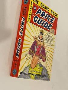 lot 182 image: 2 Vintage Comic Book Price Guide Paperbacks