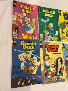 lot 210 image: 8 Vintage Donald Duck Comic Books