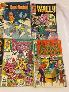 lot 211 image: 8 vintage Comic Books in Used Condition