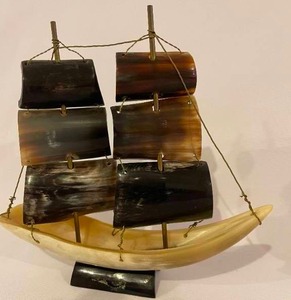 lot 258 image: 2 Vintage Elk Horn Carved Sailboats