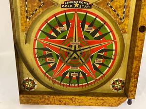 lot 325 image: Vintage Lindstrom Gold Star Marble Game Believed to be From 1934