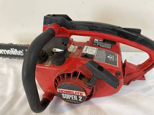lot 351 image: Homelite 16 Inch Gas Powered Chainsaw