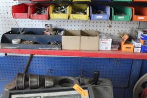 Storage Shelf  with Tire Stems and Hardware