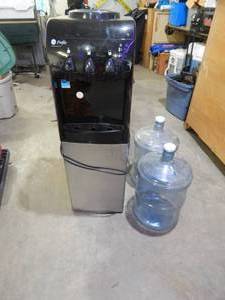 lot 48 image: GE Profile HotCold Water Dispenser With 2-Empty Jugs