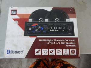 lot 50 image: New Dual Blu Tooth Car Stereo With 2 6-12 Speakers