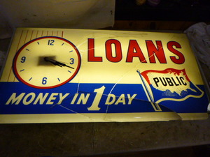 lot 16 image: Plastic Loans Clock Sign