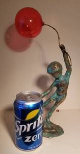 lot 31 image: Brass Boy with Glass Red Balloon Statue
