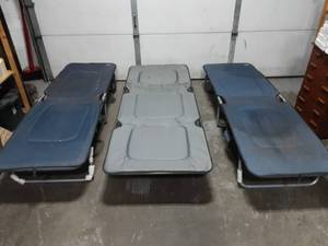 lot 5 image: 4-Cots 3-Rio Adventure Folding Cots & 1 Other
