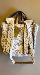 lot 72 image: BACKPACK PURSE WITH COWHIDE FLAP