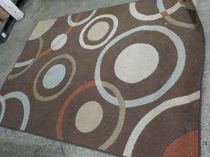 lot 57 image: Area Rug 62 x 90 needs cleaning...