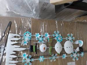 lot 72 image: Snow Flake Snowman Wind Chime...