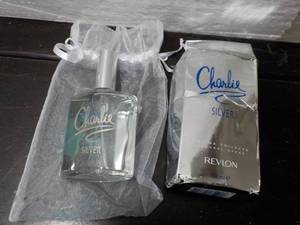 lot 107 image: Revlon Charlie Silver...