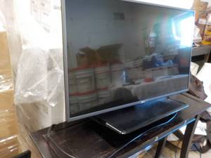 lot 240 image: 42 Flat Screen LGTV with Wall Moun...