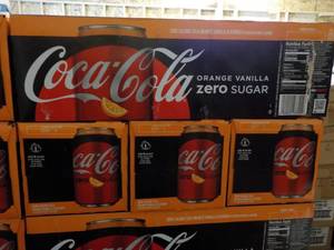 lot 297 image: 4 - 12 pkgs Coca Cola Orange Vanill...