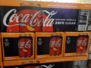 lot 298 image: 4 - 12 pkgs Coca Cola Orange Vanill...