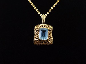 lot 1 image: .925 Sterling Silver Emerald Cut Topaz Vermeil Pendant Necklace