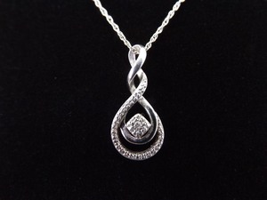 lot 27 image: .925 Sterling Silver Diamond Accented Infinity Pendant Necklace