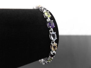 lot 40 image: .925 Sterling Silver Multi Stone Bracelet
