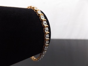 lot 42 image: .925 Sterling Silver Diamond Accented Vermeil Bracelet
