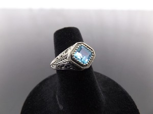 lot 52 image: .925 Sterling Silver Topaz Scrolled Ring Size 5.75