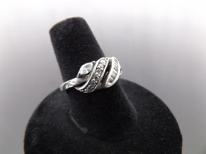 lot 82 image: .925 Sterling Silver Multiple Cut Zirconia Styled Ring Size 7