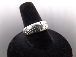 lot 87 image: .925 Sterling Silver Moon and Stars Band Ring Size 8.75