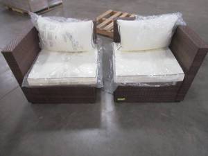 lot 107 image: 2-Piece Rattan Outdoor Chairs with Cushions - May need some tightening.