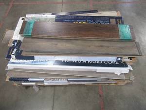 lot 215 image: WHOLESALE MIXED PALLET OF MISCELLANEOUS VINYL AND WOOD FLOORING