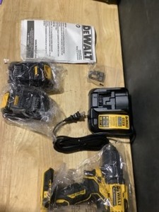 lot 28 image: DEWALT ATOMIC 20-Volt MAX Cordless Brushless Compact 12 in. DrillDriver, (2) 20-Volt 1.3Ah Batteries, Charger & Bag See Pictures