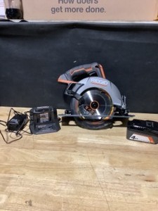 lot 32 image: RIDGID 18V OCTANE Brushless Cordless 7-14 in. Circular Saw with 18V Lithium-Ion 4.0 Ah Battery See Pictures