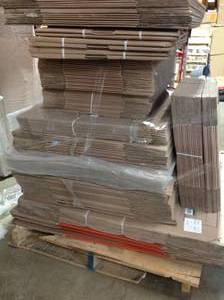 Pallet with assorted Home Depo Moving Storage Cardboard boxes various sizes and conditions not used Tall Pallet see pictures