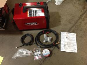 Lincoln Elec 25 Amp Weld-Pak 125 HD Flux-Cored Welder with Magnum 100L Gun, Flux-Cored Wire, 115V not used see pictures