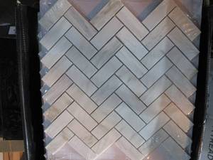 lot 49 image: Angora Herringbone 12 in. x 12 in. x 10 mm Polished Marble Mosaic Tile (50 sq. ft.)