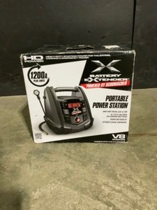lot 6 image: Schumacher Battery Extender 12-Volt 1,200 Amp Battery Jump Starter. See Pictures