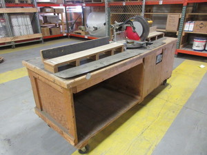 lot 829 image: CHOP SAW MOUNTED ON A ROLLING CABINET