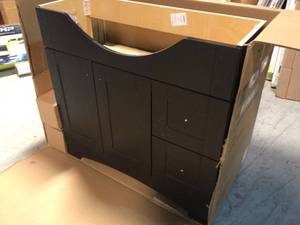 lot 21 image: Highmont 41 in. W x 17-58 in. D Vanity in Coffee Bean with Porcelain Vanity Top in Solid White with White Basin by Glacier Bay Customer Returns See Pictures