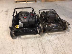 lot 40 image: Lot of 2 Assorted 21 in. 140 cc Briggs & Stratton 2-in-1 Gas Walk Behind Push Lawn Mower with high rear wheels and mulch or rear bag by Murray Customer Returns See Pictures