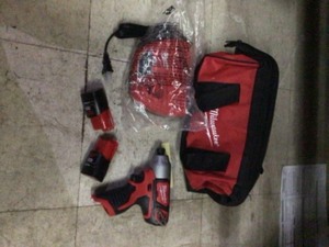 Milwaukee M12 12-Volt Lithium-Ion Cordless 14 in. Impact Driver Kit W(2) 1.5Ah Batteries, Charger & bag