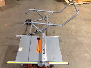 lot 29 image: Ridgid 10 in. Pro Jobsite Table Saw with Stand turns on but then shuts off needs repair see pictures