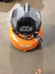 lot 41 image: Ridgid 6 Gal Pancake compressor in like new condition