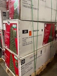 lot 44 image: Pallet of assorted Christmas Trees various Sizes and Models see pictures