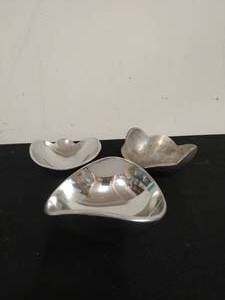lot 69 image: Set of Three Pintel Collection Bowls by Towle