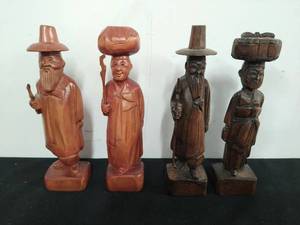 lot 155 image: Four Hand Carved Wood Figures