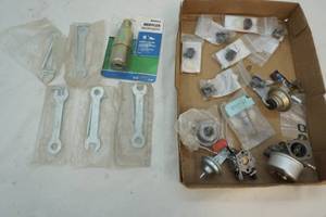 lot 12 image: new small engine parts, tools