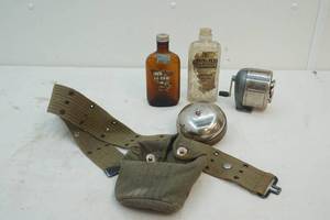 lot 41 image: military belt, bottles, ring bell