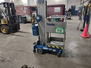 Genie Model AWP-24 Manlift, 300 lb....