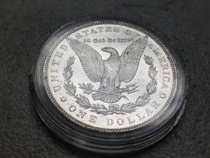 lot 03 image: 1883 MORGAN SILVER DOLLAR UNC IN AIRTITE