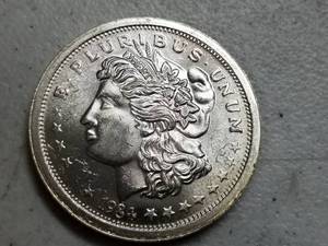 lot 29 image: 1984 MORGAN DESIGN 1 TROY OZ .999 FINE SILVER TRADE UNIT